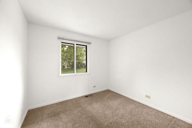 728 Boxwood Dr, Schaumburg, IL 60193 - carpeted spare room featuring baseboards