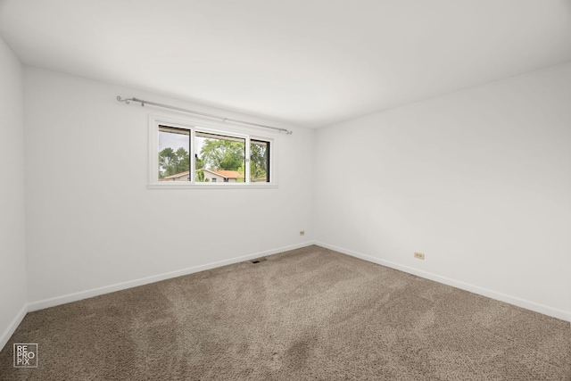 728 Boxwood Dr, Schaumburg, IL 60193 - empty room featuring baseboards and carpet floors