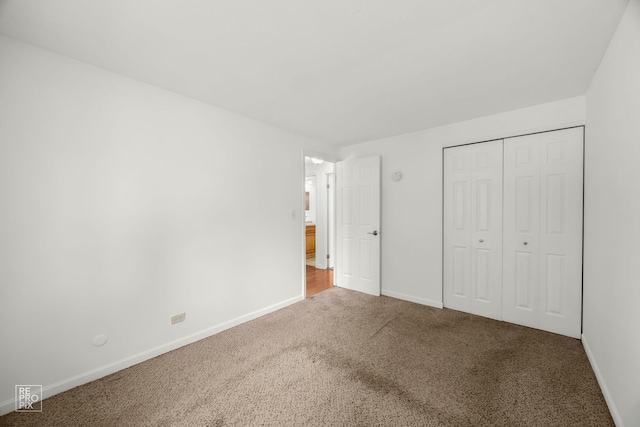 728 Boxwood Dr, Schaumburg, IL 60193 - unfurnished bedroom featuring carpet flooring and a closet