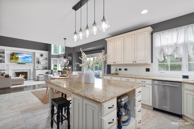 40W379 E Laura Ingalls Wilder Rd, Saint Charles, IL 60175 - kitchen featuring stainless steel dishwasher, plenty of natural light, open floor plan, a center island, and recessed lighting