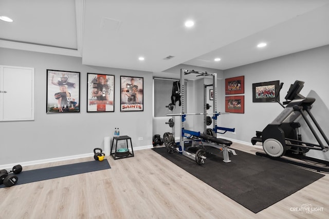 40W379 E Laura Ingalls Wilder Rd, Saint Charles, IL 60175 - exercise room featuring recessed lighting, wood finished floors, and crown molding