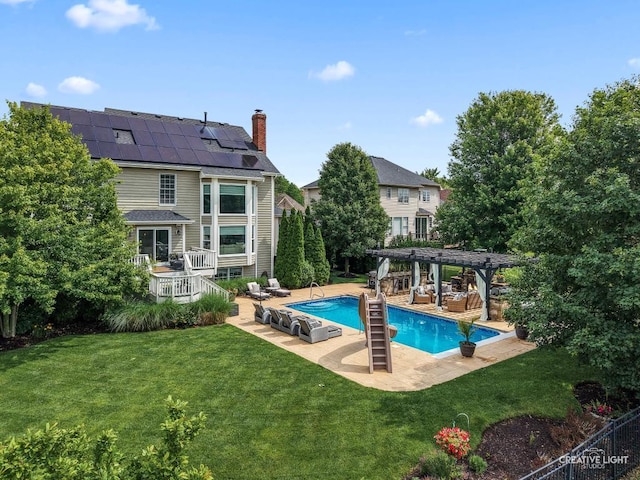 40W379 E Laura Ingalls Wilder Rd, Saint Charles, IL 60175 - swimming pool featuring a pergola, a yard, a deck, and a patio