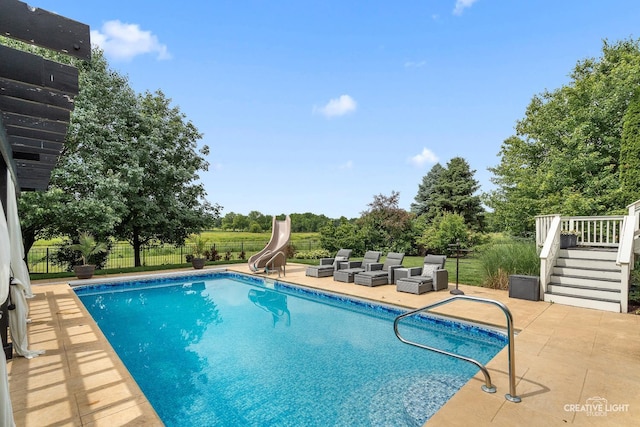 40W379 E Laura Ingalls Wilder Rd, Saint Charles, IL 60175 - view of pool featuring a water slide, a patio area, stairway, and a deck