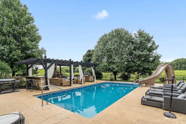 40W379 E Laura Ingalls Wilder Rd, Saint Charles, IL 60175 - view of swimming pool featuring outdoor lounge area, a pergola, a patio area, and a water slide