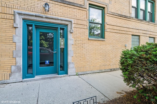 2709 W Belden Ave Unit 3, Chicago, IL 60647 - view of exterior entry featuring brick siding