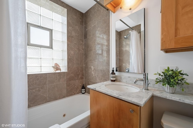 2709 W Belden Ave Unit 3, Chicago, IL 60647 - bathroom with healthy amount of natural light, vanity, and a combined bath / shower with jetted tub