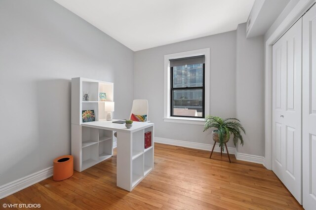 2709 W Belden Ave Unit 3, Chicago, IL 60647 - office with light wood-style flooring and baseboards