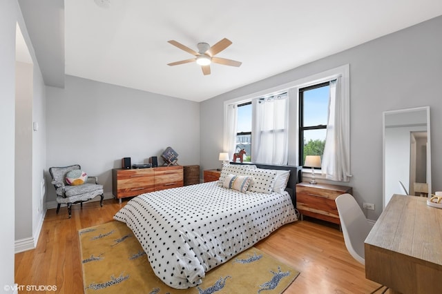 2709 W Belden Ave Unit 3, Chicago, IL 60647 - bedroom with light wood-style floors and ceiling fan