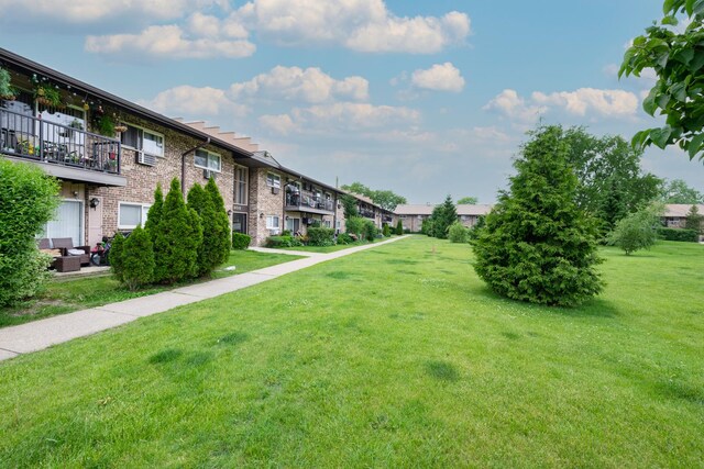 808 E Old Willow Rd Unit 208, Prospect Heights, IL 60070 - view of home's community featuring a lawn and a residential view
