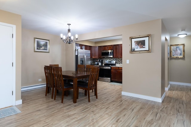 808 E Old Willow Rd Unit 208, Prospect Heights, IL 60070 - dining area featuring a chandelier, light wood-style flooring, and a baseboard radiator