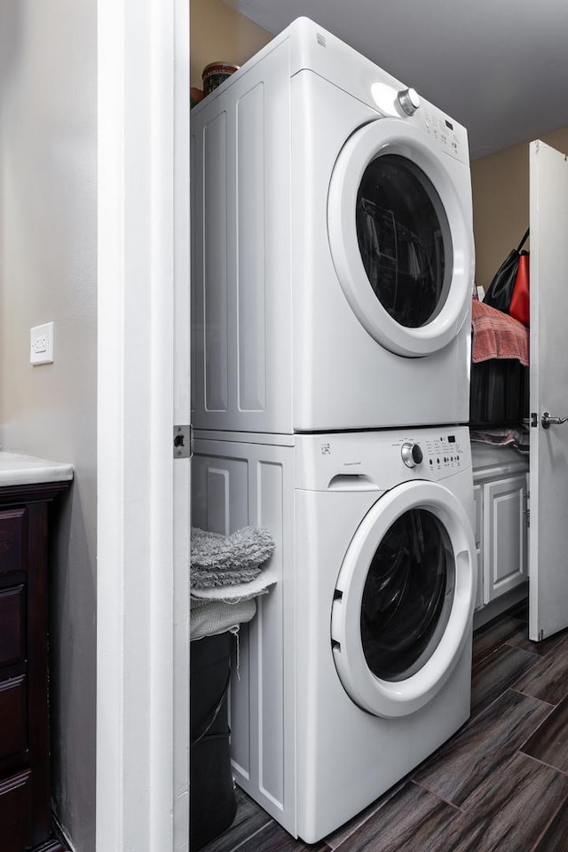808 E Old Willow Rd Unit 208, Prospect Heights, IL 60070 - laundry room with estacked washer and dryer and dark wood-style flooring