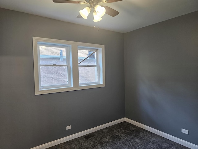12136 S Wentworth Ave, Chicago, IL 60628 - unfurnished room featuring dark carpet and a ceiling fan