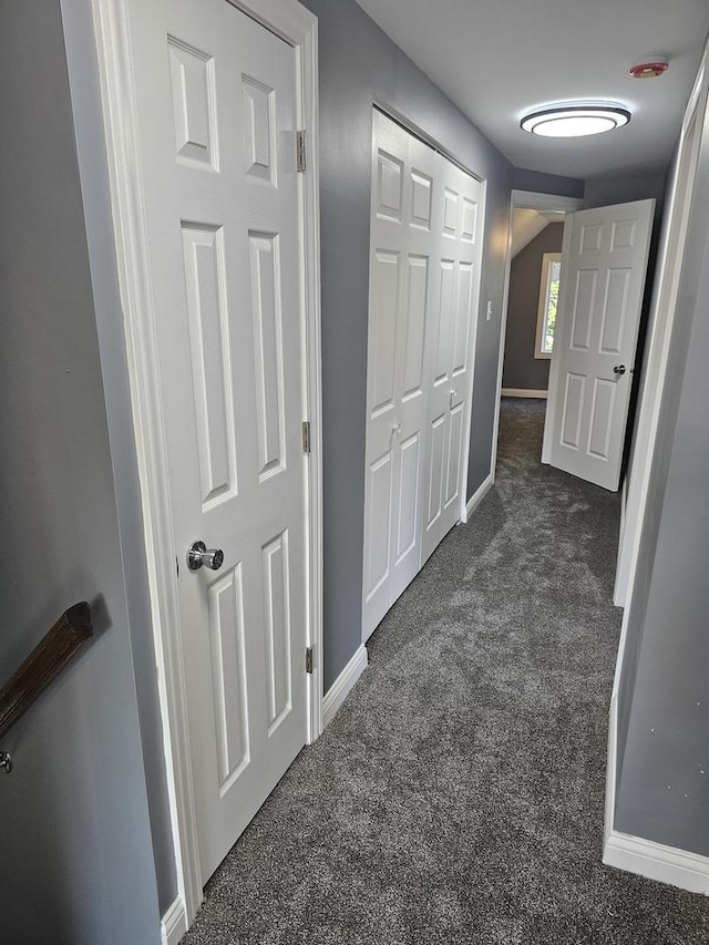 12136 S Wentworth Ave, Chicago, IL 60628 - corridor featuring dark colored carpet and baseboards