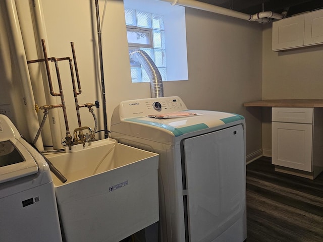 12136 S Wentworth Ave, Chicago, IL 60628 - washroom with washer and clothes dryer and dark wood-type flooring