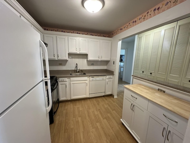 900 E Wilmette Rd Unit 411, Palatine, IL 60074 - kitchen with white appliances, white cabinets, light wood-type flooring, and wood counters