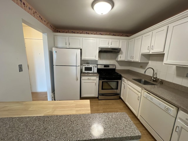 900 E Wilmette Rd Unit 411, Palatine, IL 60074 - kitchen with white appliances, under cabinet range hood, and white cabinets