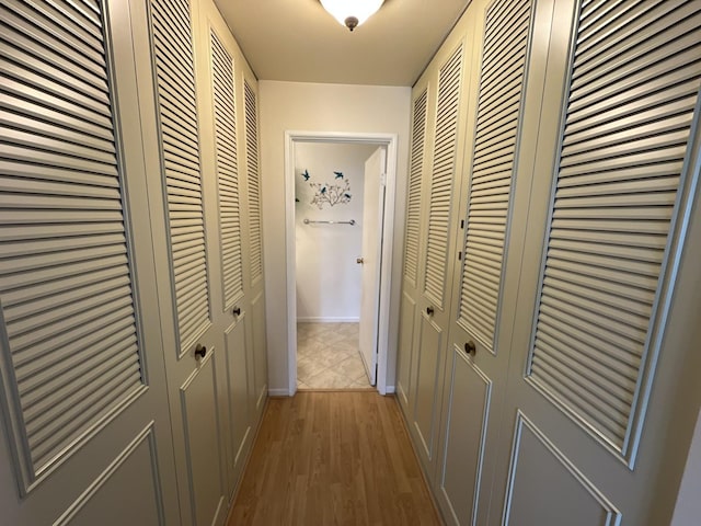 900 E Wilmette Rd Unit 411, Palatine, IL 60074 - hall featuring light wood-style floors and baseboards