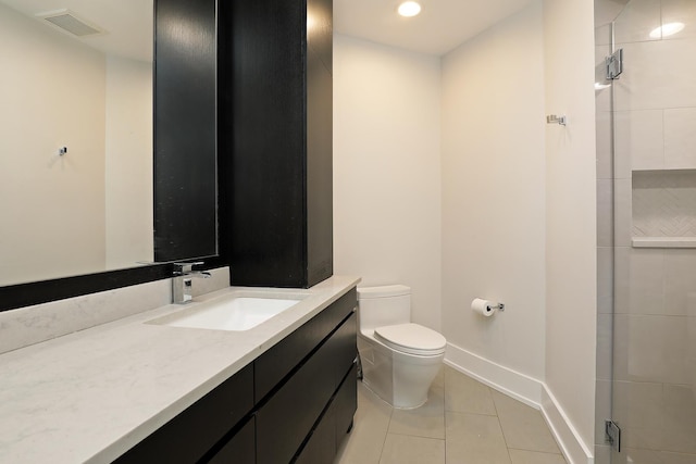 1630 Ridge Rd, Highland Park, IL 60035 - bathroom featuring vanity, tile patterned floors, a tile shower, and recessed lighting