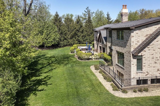 1630 Ridge Rd, Highland Park, IL 60035 - view of green lawn with a patio area