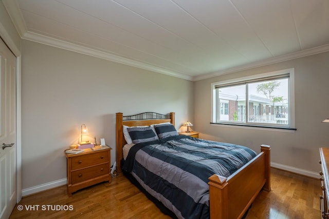 100 Deborah Ln Unit B23, Wheeling, IL 60090 - bedroom featuring wood finished floors and ornamental molding
