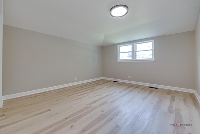 4021 W Estes Ave, Lincolnwood, IL 60712 - unfurnished room with light wood-style flooring