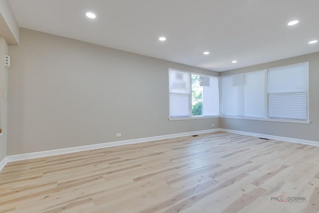 4021 W Estes Ave, Lincolnwood, IL 60712 - spare room featuring light wood finished floors and recessed lighting
