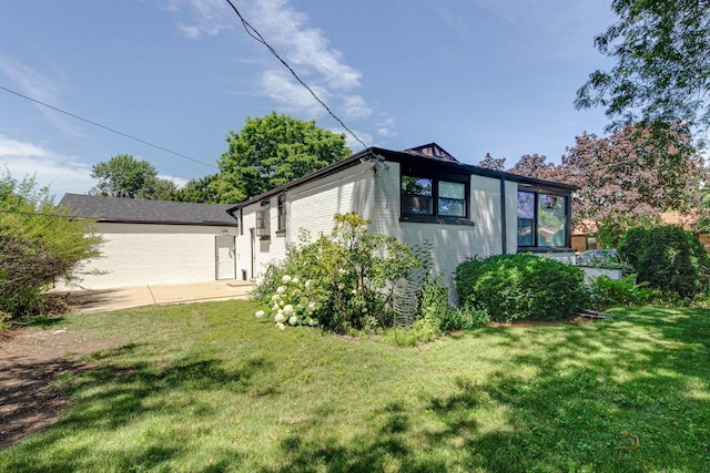 4021 W Estes Ave, Lincolnwood, IL 60712 - view of property exterior with a lawn