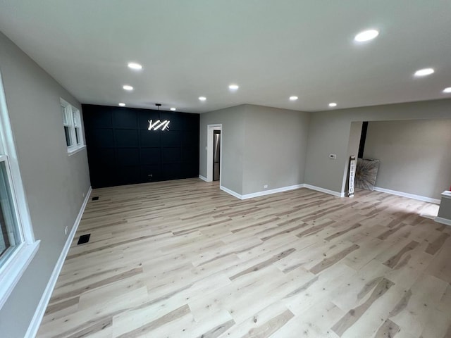 4021 W Estes Ave, Lincolnwood, IL 60712 - unfurnished room featuring light wood finished floors and recessed lighting