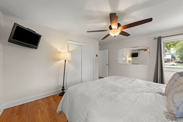 2839 School St, Flossmoor, IL 60422 - bedroom with a closet, wood finished floors, and a ceiling fan