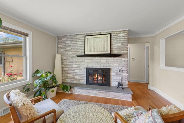2839 School St, Flossmoor, IL 60422 - living area with a fireplace, wood finished floors, and crown molding