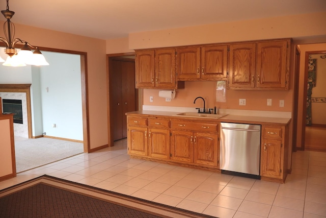 19443 Trenton Way, Mokena, IL 60448 - kitchen featuring dishwasher, light countertops, brown cabinets, hanging light fixtures, and a chandelier