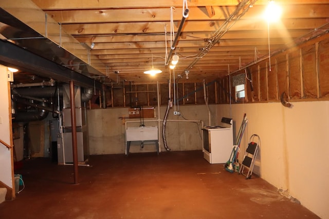 19443 Trenton Way, Mokena, IL 60448 - unfinished below grade area featuring washer / dryer and a sink
