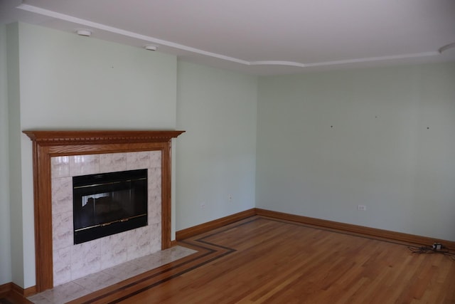 19443 Trenton Way, Mokena, IL 60448 - unfurnished living room with wood finished floors and a tiled fireplace