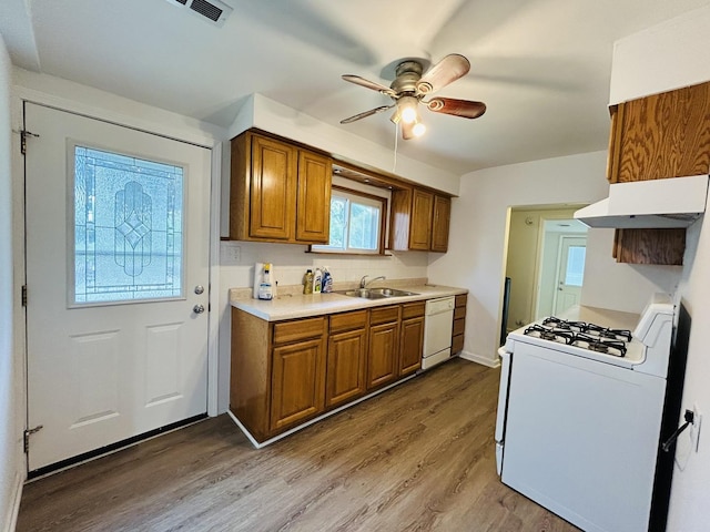 37706 N Nippersink Pl, Spring Grove, IL 60081 - kitchen featuring white appliances, under cabinet range hood, brown cabinets, ceiling fan, and wood finished floors
