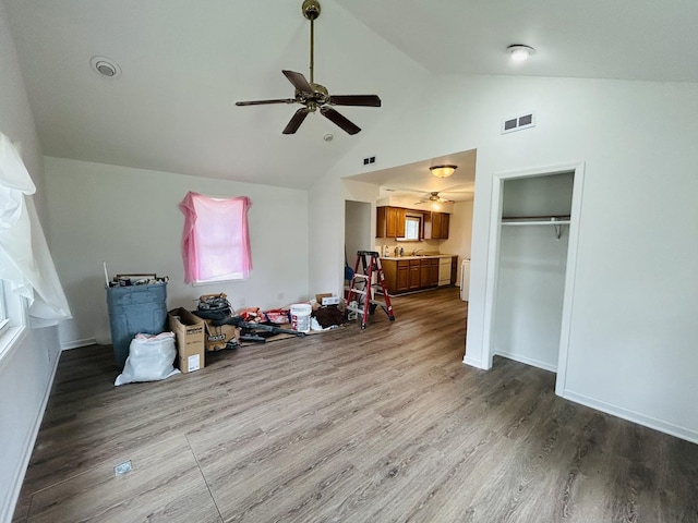 37706 N Nippersink Pl, Spring Grove, IL 60081 - living area with ceiling fan, high vaulted ceiling, and wood finished floors