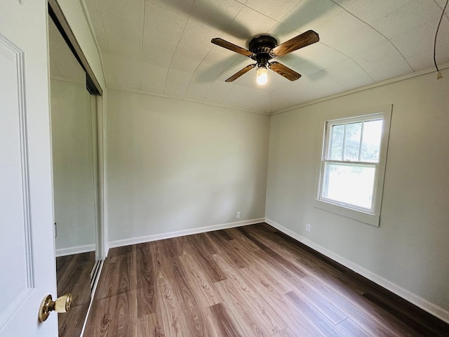 37706 N Nippersink Pl, Spring Grove, IL 60081 - empty room featuring dark wood finished floors and ceiling fan