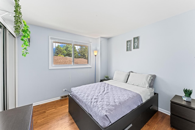 2135 N Haig Ct, Palatine, IL 60074 - bedroom with wood finished floors and baseboards