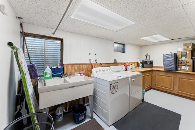 2135 N Haig Ct, Palatine, IL 60074 - washroom with separate washer and dryer, cabinet space, and wooden walls
