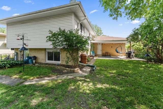 2135 N Haig Ct, Palatine, IL 60074 - back of property featuring a patio area and a yard
