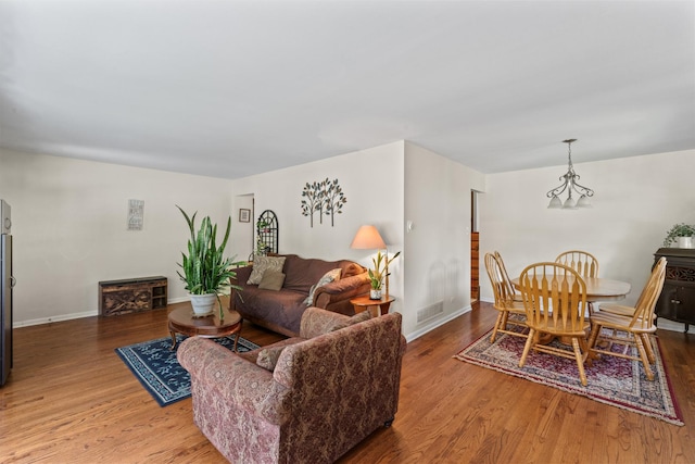 2135 N Haig Ct, Palatine, IL 60074 - living area with wood finished floors and a chandelier