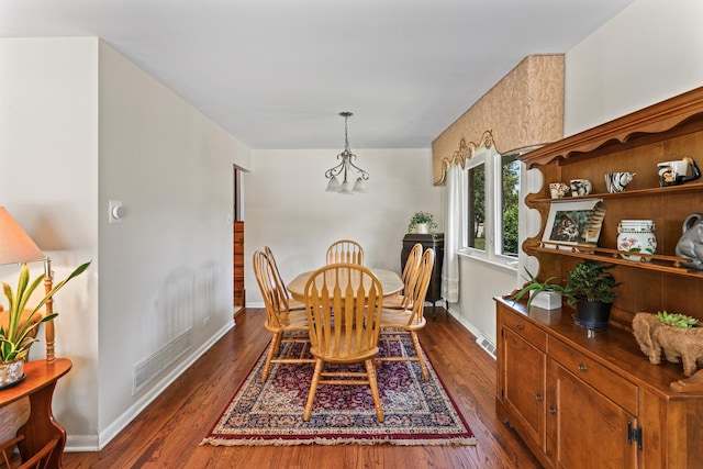 2135 N Haig Ct, Palatine, IL 60074 - dining area with dark wood finished floors and a chandelier