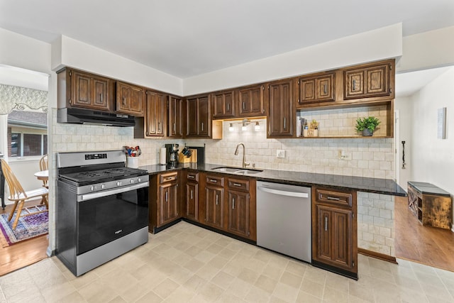 2135 N Haig Ct, Palatine, IL 60074 - kitchen with stainless steel appliances, under cabinet range hood, open shelves, and dark stone counters