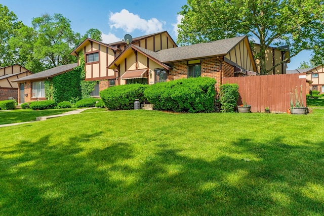 1S222 Danby St, Villa Park, IL 60181 - tudor house with brick siding, board and batten siding, and roof with shingles
