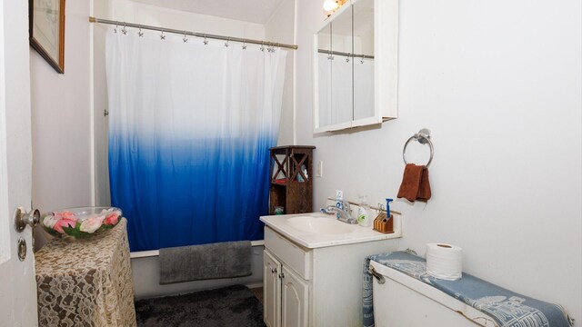 312 N Mclean St, Bloomington, IL 61701 - bathroom featuring vanity and shower / tub combo with curtain