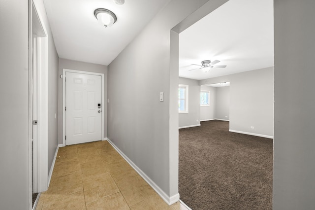1055 N Bluebonnet Ln, Hoffman Estates, IL 60169 - corridor with baseboards and tile patterned floors