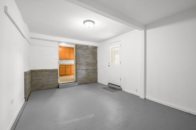 1055 N Bluebonnet Ln, Hoffman Estates, IL 60169 - spare room with finished concrete floors and baseboards