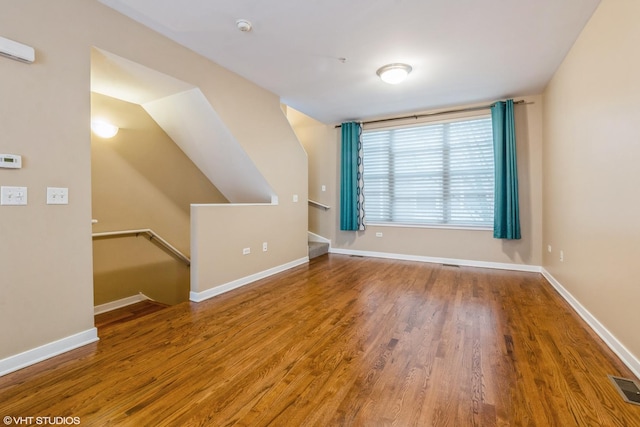 1240 W Monroe St Unit 7, Chicago, IL 60607 - unfurnished room featuring wood finished floors and a smoke detector