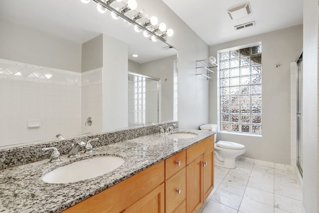 2332 W Huron St Unit 4, Chicago, IL 60612 - bathroom featuring a stall shower, double vanity, and marble finish floors