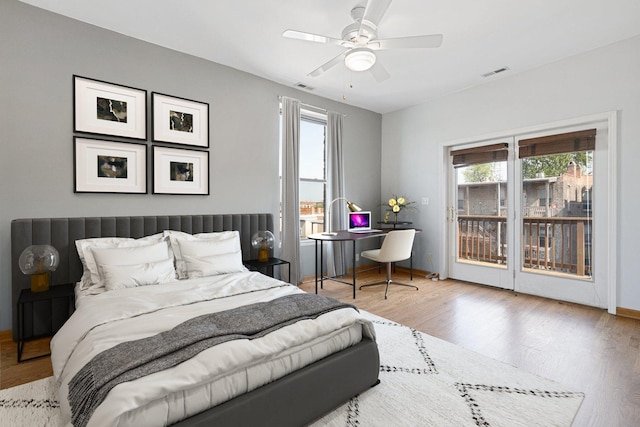 2332 W Huron St Unit 4, Chicago, IL 60612 - bedroom with access to exterior, multiple windows, and wood finished floors