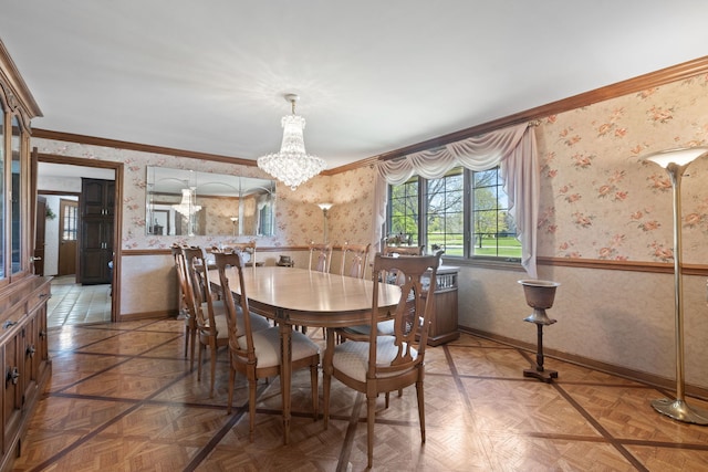 10 Shoreside Dr, South Barrington, IL 60010 - dining space with wallpapered walls, crown molding, a chandelier, and a wainscoted wall